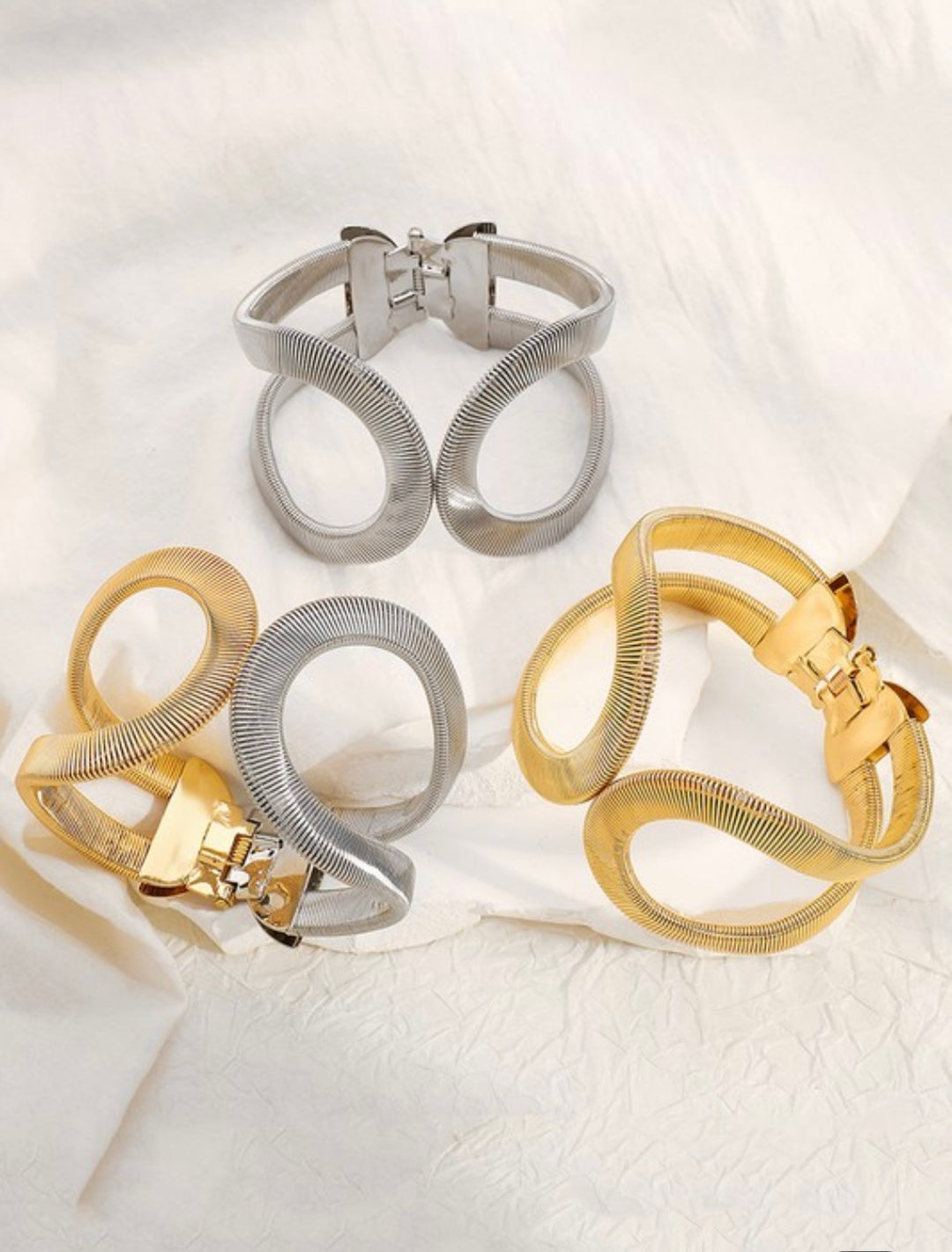 Bold Hollow Twist Metal Bangle Bracelet – Gold & Silver