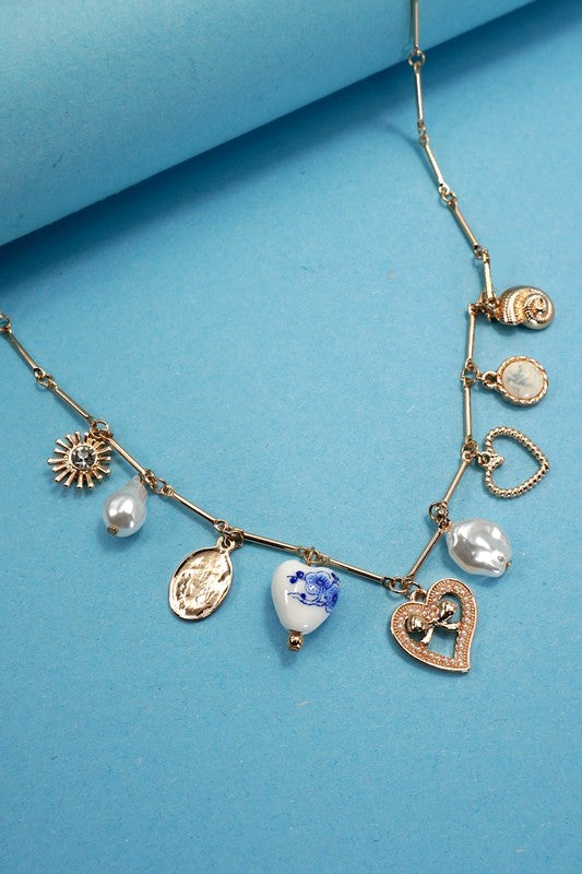 The Storyteller Charm Necklace – Vintage Gold Heart & Pearl