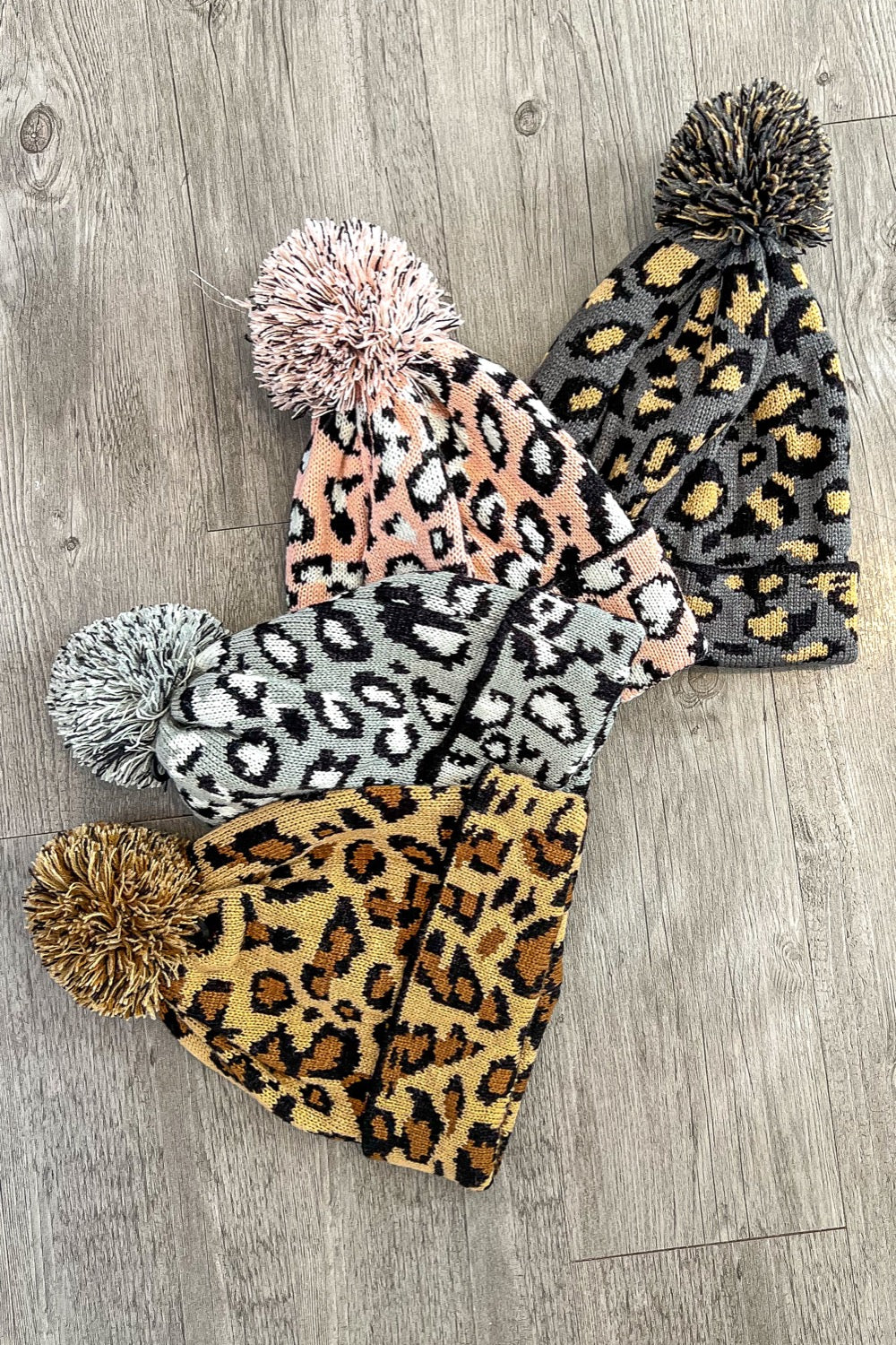 Leopard Print Beanie With Fur Puff On Top